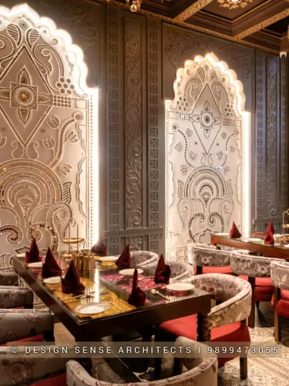 The magic is in the details. This dining section features custom-designed, backlit panels with intricate carvings, creating an intimate and opulent atmosphere for guests. It's about making every corner of the restaurant feel special.