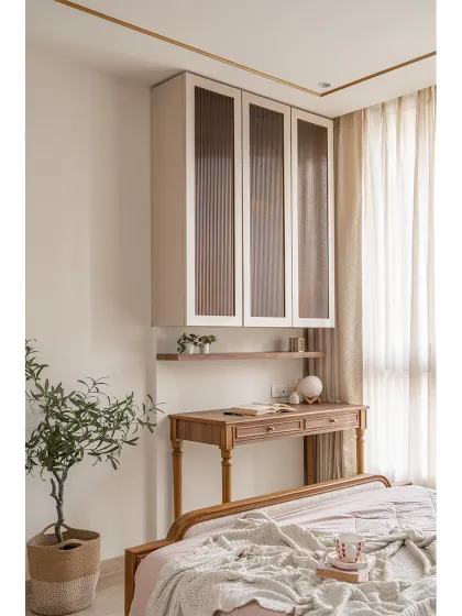 In this bedroom, I built the wooden study desk and the floating wall cabinet with fluted glass doors. The design combines classic turned legs on the desk with modern, clean lines for the storage, showing how I can mix styles within a single room.