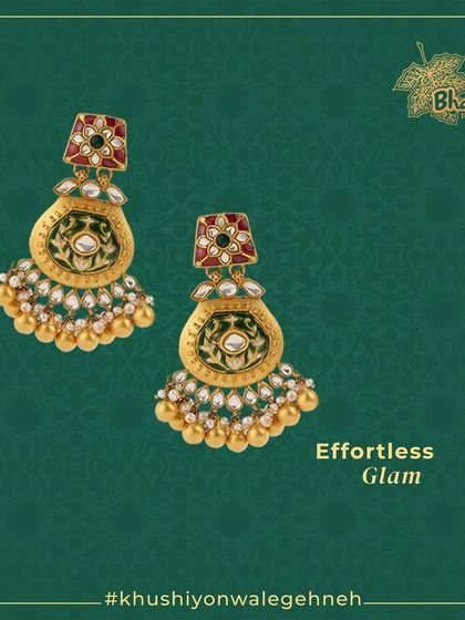 Elevate your look with these stunning Meenakari earrings. The intricate designs are embellished with moti, kundan, pearls, and diamonds, showcasing a perfect balance of color and glamour.