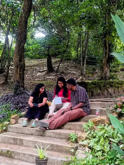 We take our work wherever inspiration strikes. Here, a small group is deep in a story development session on the steps outside, surrounded by the natural beauty of the resort. A change of scenery can often unlock new perspectives on a difficult plot point.