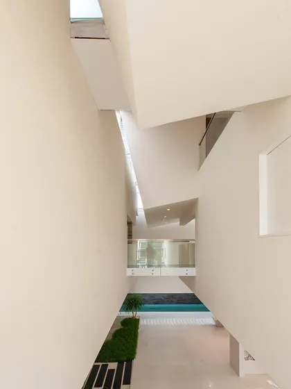 The resulting interior volume at the Neeti Residence. This is what we mean by designing with the bones of a space, where overlapping planes and natural light create a dynamic yet serene environment.