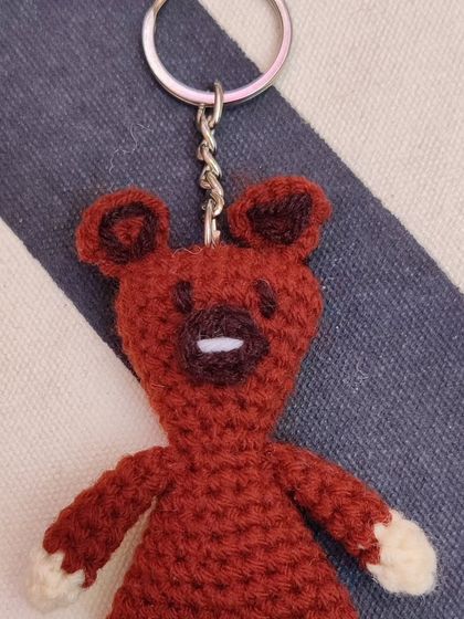 A mini version of Mr. Bean's teddy, perfect for adding a touch of nostalgia to your keys.