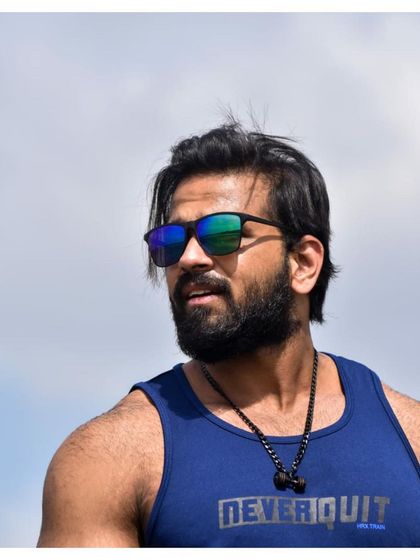 I know looks aren’t everything, but I have them just in case. A confident shot from outside the gym, showing that fitness is part of my identity.