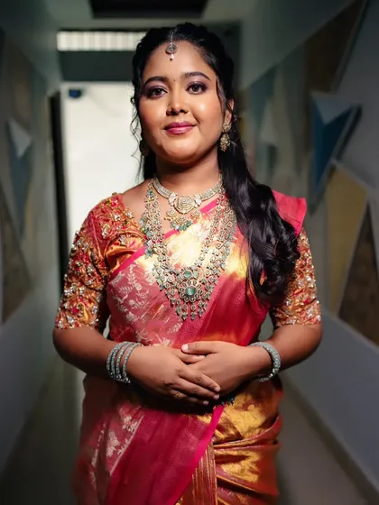 A beautiful portrait of a bride in her reception attire, looking elegant and graceful.
