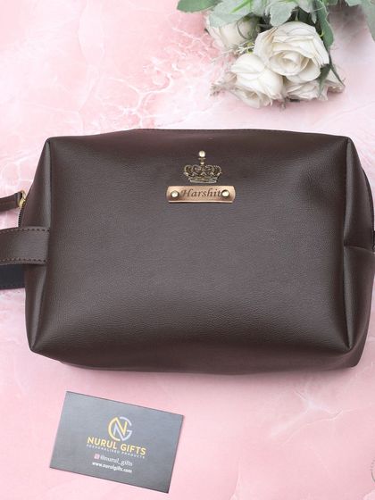This personalized leather pouch in a classic dark brown is a versatile and practical gift for anyone.