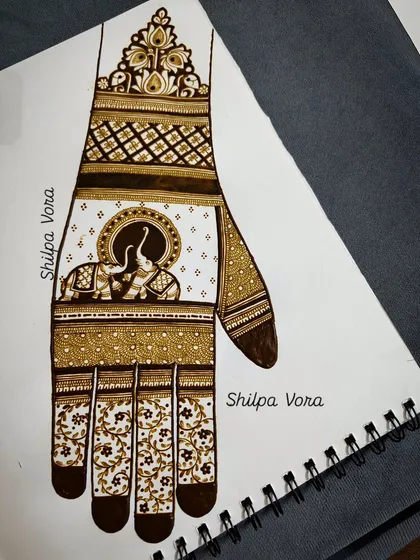 A design sketch on paper, featuring a traditional elephant motif. This is how I plan my intricate compositions.