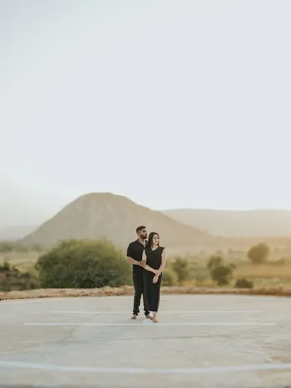 A powerful and modern portrait on the helipad. The symmetry and starkness of the location create a very contemporary and stylish pre-wedding photograph.
