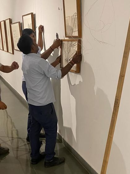 The team and artist Mohit Mahato hanging works for his show 'Bring me Flowers'. I work closely with artists to ensure the final hang aligns with their vision for the exhibition.