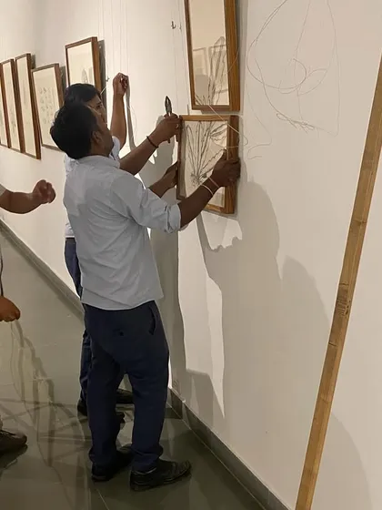 The team and artist Mohit Mahato hanging works for his show 'Bring me Flowers'. I work closely with artists to ensure the final hang aligns with their vision for the exhibition.