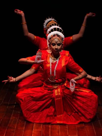 This photo from our 'Raṅg' production highlights the use of multi-level formations and expressive postures to create a visually captivating narrative on stage.