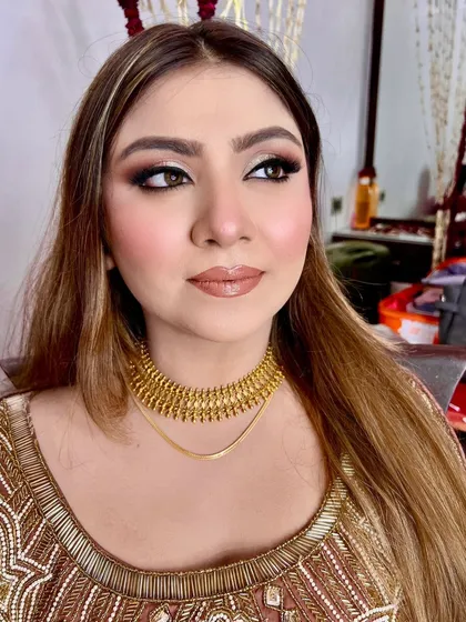 My beautiful bride Ilma, ready for her reception. She gave me complete freedom, so we went for a glamorous and sophisticated look.