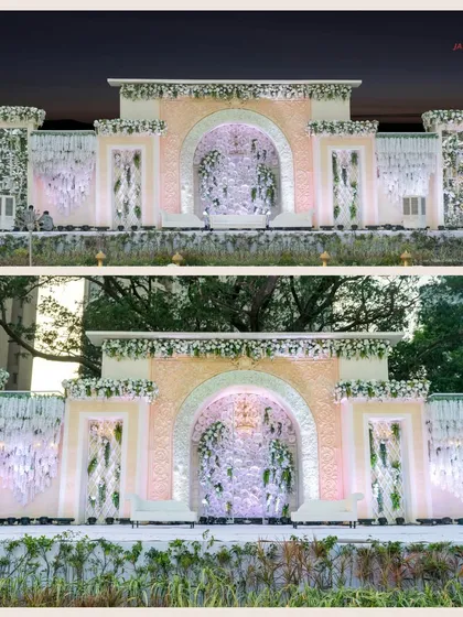 This stage shows the power of architectural design in decor. The grand, multi-layered facade creates a sense of depth and history, providing a regal and impressive backdrop for any celebration.