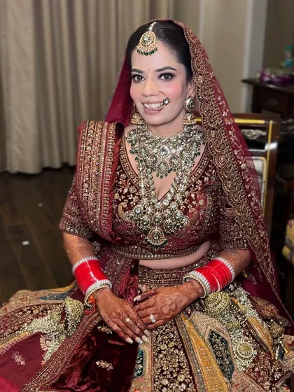 The happy bride, Ashima. Her smile says it all. The makeup is designed to enhance her joy and radiance.