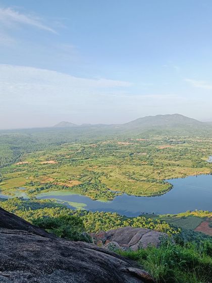 The breathtaking view of the lake and surrounding greenery from the Makalidurga trail.