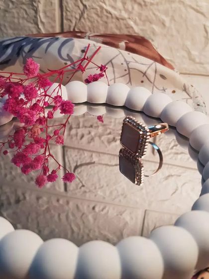 The bubble mirror is perfect for flat-lay photography or as a decorative tray for your most precious items. Here, it beautifully reflects a statement ring.