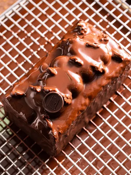We love capturing irresistible textures. This shot of a chocolate loaf cake from House of Amel focuses on the thick, glossy ganache dripping over the sides.