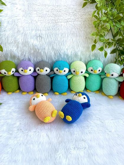 A rainbow of penguin babies! I made this colorful flock as return gifts for a birthday party. Each penguin is a different color, making them a unique and memorable party favor.