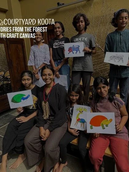 Young creators proudly display their artwork from the "Stories from the Forest" workshop. In this session, they learned the techniques of Gond art, a vibrant tribal art form from Madhya Pradesh, to tell their own visual stories.