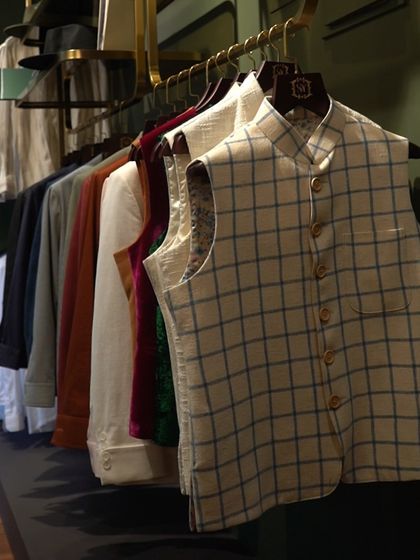 Style that adapts to your every move. A collection of our Nehru vests in various fabrics and patterns, from classic checks to solid velvets, hangs ready for any occasion.