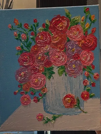 A close-up of a beautiful and richly textured floral bouquet painting, created with palette knives.