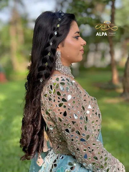 The back of the hairstyle, showing the full length of the intricate braid.