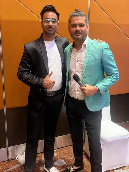 With the event anchor after a successful show for Castrol. Teamwork makes the dream work.