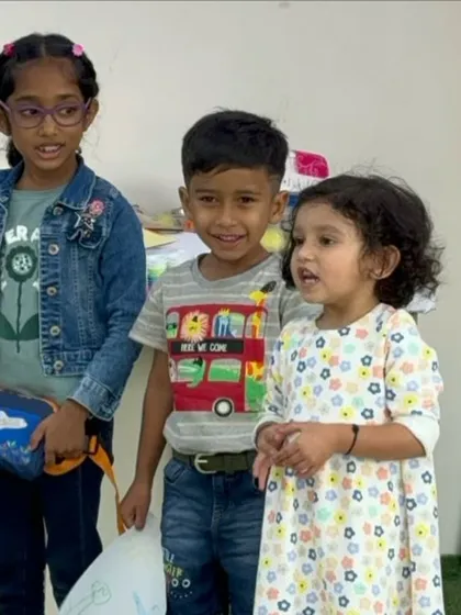 Three of our youngest participants at the 'Palette Harmony' workshop, full of smiles and ready to create. We welcome kids as young as three to join in the fun.