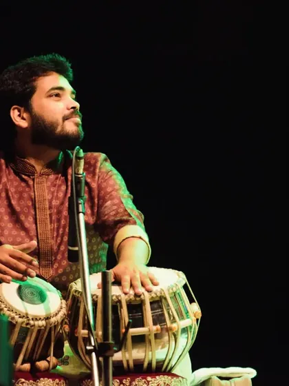 Looking upwards during the 'Shefali' concert, lost in the music.