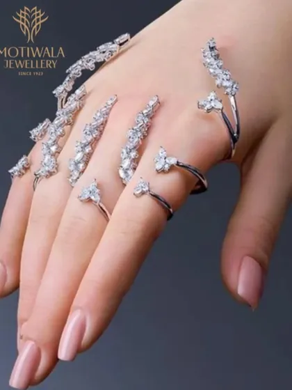 Redefining adornment with avant-garde design. These articulated diamond nail rings are a bold expression of individuality, crafted with marquise and pear-shaped diamonds that trace the form of the fingers. This is where our innovative spirit meets high jewellery craftsmanship.