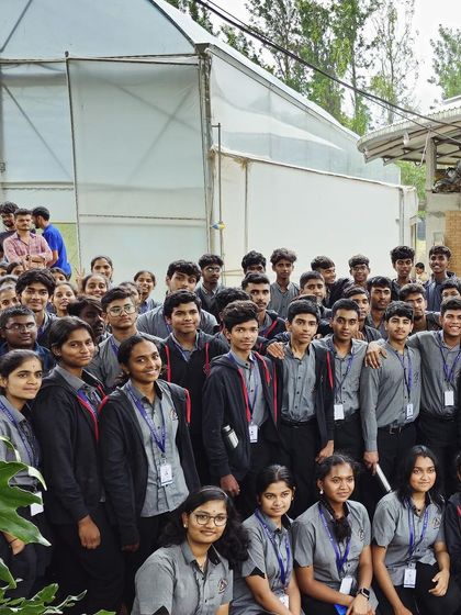 Students from Trinity College pose for a group photo in front of our greenhouse. We are thrilled to be a part of their educational journey.