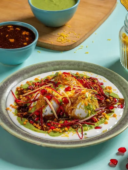 Dahi Bhalla, soft lentil dumplings soaked in yogurt and topped with sweet and spicy chutneys for Gulab Sweets.