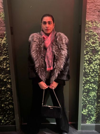 A candid moment from a night out. Even when I'm off-duty, I love a chance to dress up and have fun with fashion.