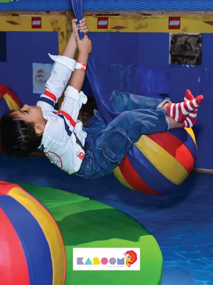 Flying through the air on our swings! The joy on this child's face is what we're all about.