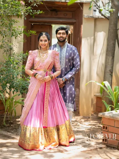 To complement your children's outfits, I also design exquisite attire for parents, perfect for creating a coordinated family look. Here, I transformed a traditional Kanchi saree into a grand light pink lehenga, paired with a hand-embroidered blouse, showcasing the level of bespoke craftsmanship I bring to every piece.