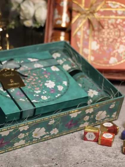 A closer look at the teal floral gift box set. Notice how the colors of the products inside complement the packaging.