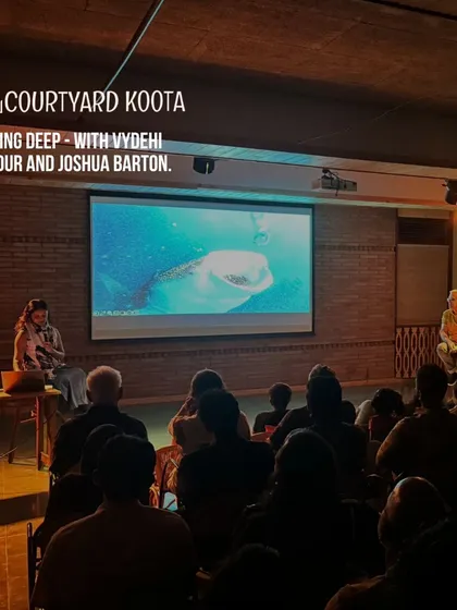 A screening and discussion in progress for "Diving Deep," a dialogue on exploring our oceans with Vydehi Kadur and Joshua Barton.