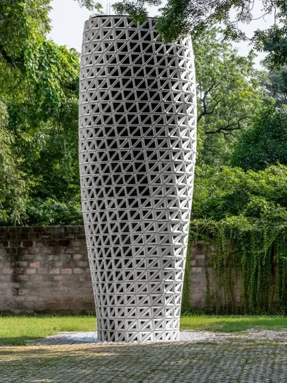 Another view of the VERTO prototype in its park setting, showing its complete form from a distance.