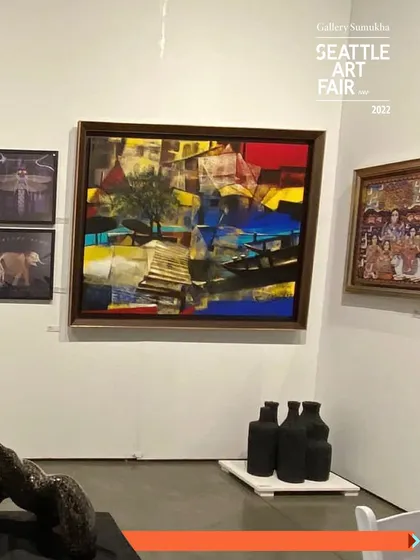 A glimpse of our booth from the 2022 Seattle Art Fair, featuring a large abstract painting and ceramic sculptures.