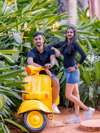 A cool and casual pose with a bright yellow scooter, adding a pop of color and a touch of Italian chic to your photos.