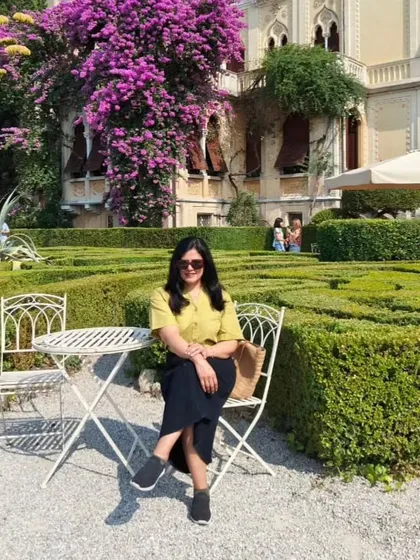 A seated photo in the stunning Villa Borghese Cavazza gardens.