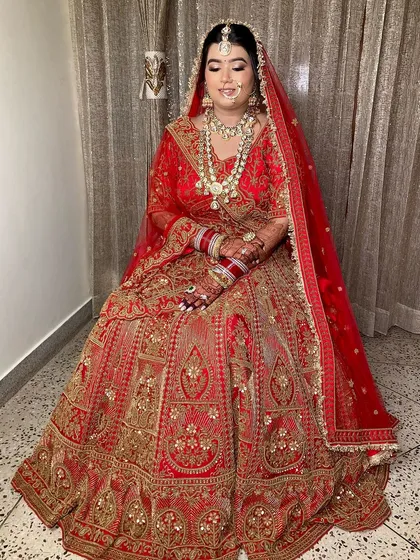 Sonakshi looked so glowing and ethereal. I loved dolling her up in this classic red lehenga, creating a look that was both traditional and radiant.