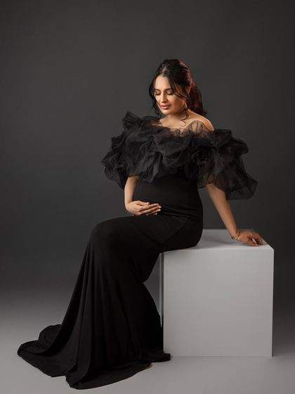 A regal seated portrait, exuding grace and elegance.