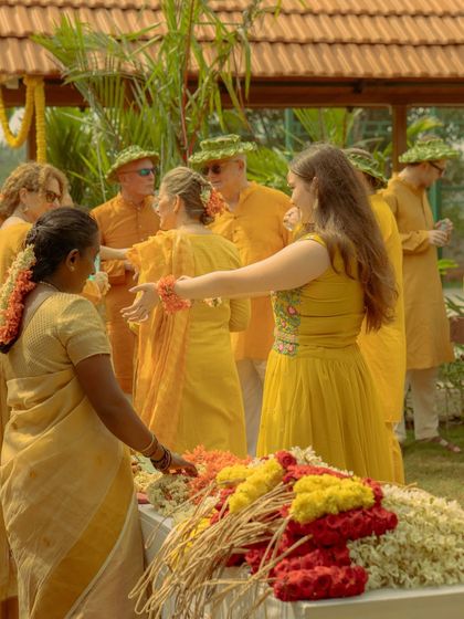 A DIY flower garland station where guests could create their own accessories. This interactive element was a huge success, allowing everyone to get creative and engage with local traditions.