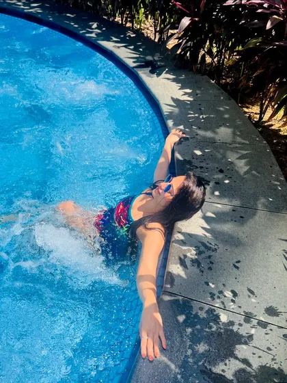 Soaking up the sun and good vibes by the pool. A little relaxation is key to a balanced fitness lifestyle.