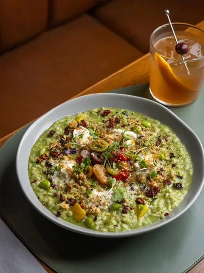 The perfect pairing. Our creamy Spring Vegetable and Hazelnut Pesto Risotto finds its match in a classic, spirit-forward cocktail. It is a harmony of comfort and sophistication.