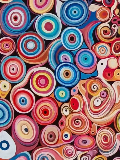 A close-up showing the variety of shapes and colors in the hand-painted patterns.