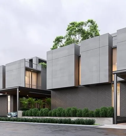 This rendering shows a prototype for a housing master plan in Bangalore. The design explores a modular system of concrete volumes, creating a modern and cohesive streetscape while allowing for individual variation in each residence.