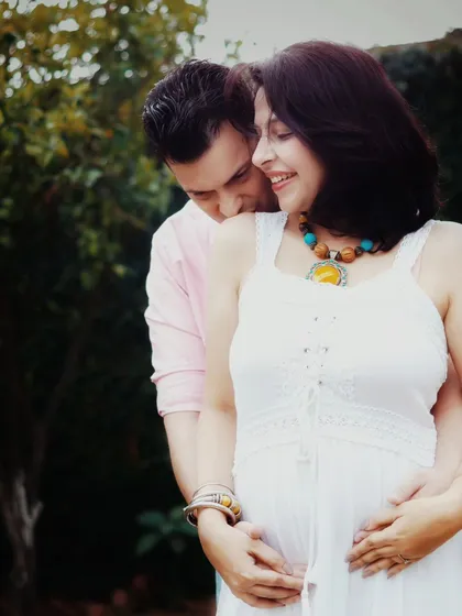 A maternity session is a celebration of the journey you are on together. This image captures the quiet intimacy and anticipation between expecting parents in a natural, outdoor setting.
