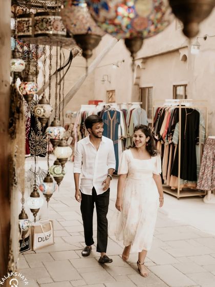 A candid walking shot through a traditional souk in Dubai, capturing the local atmosphere.