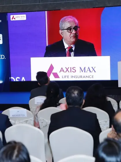 On stage during the Axis Max Life Insurance launch, with the proceedings being broadcast on the main screen.